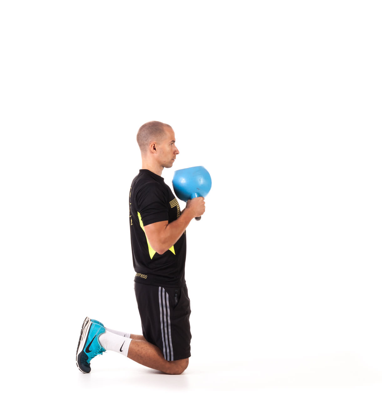 Kettlebell Kneeling to Stand Up frame #1