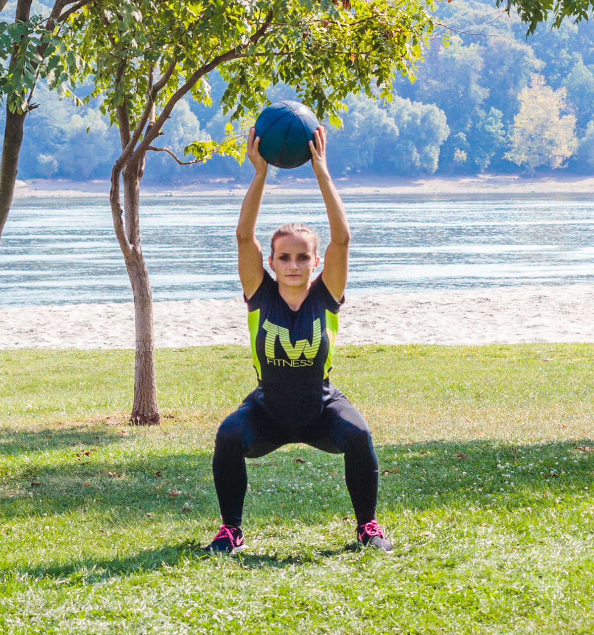 Medicine Ball Sumo Overhead Raise frame #2