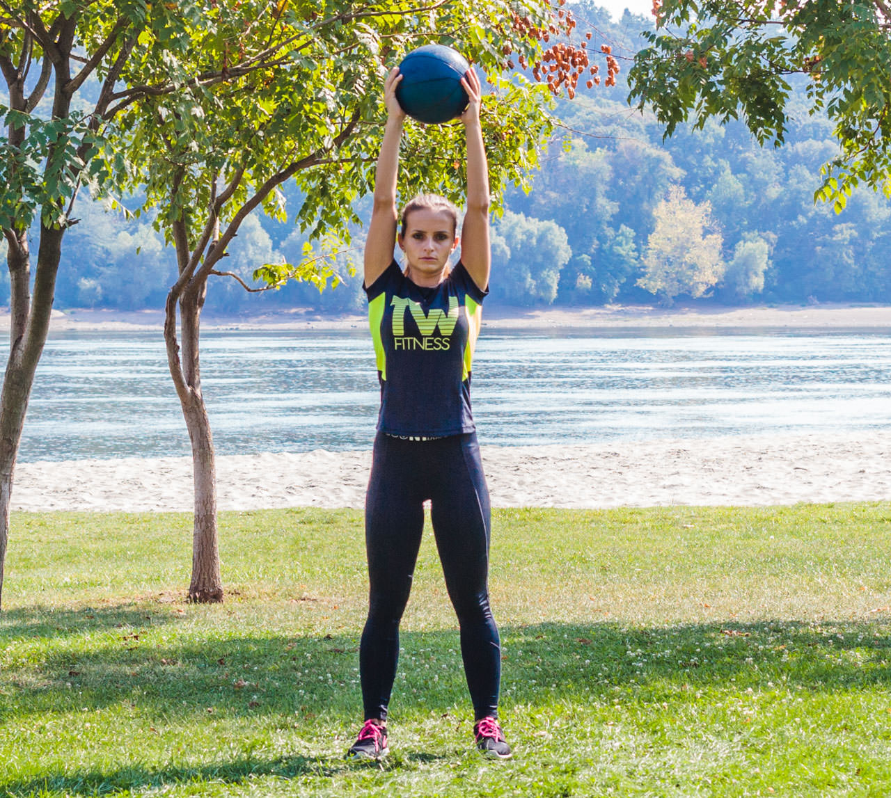 Medicine Ball Squat with Torso Rotation frame #1