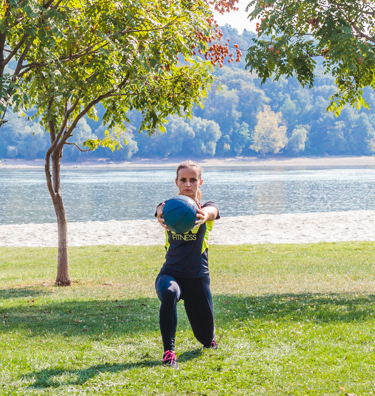 Medicine Ball Lunge with Torso Rotation frame #2