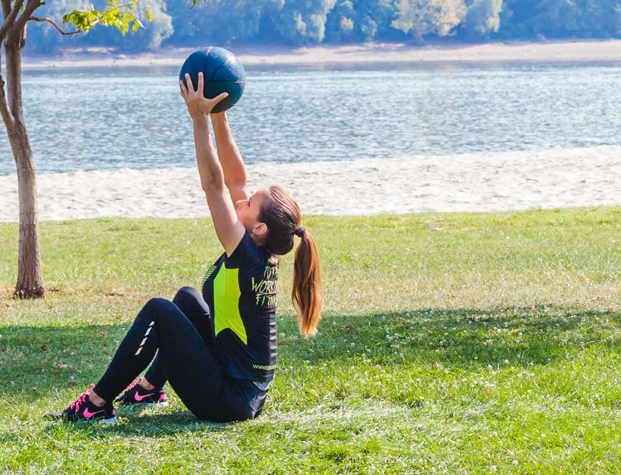 Medicine ball sit ups hot sale