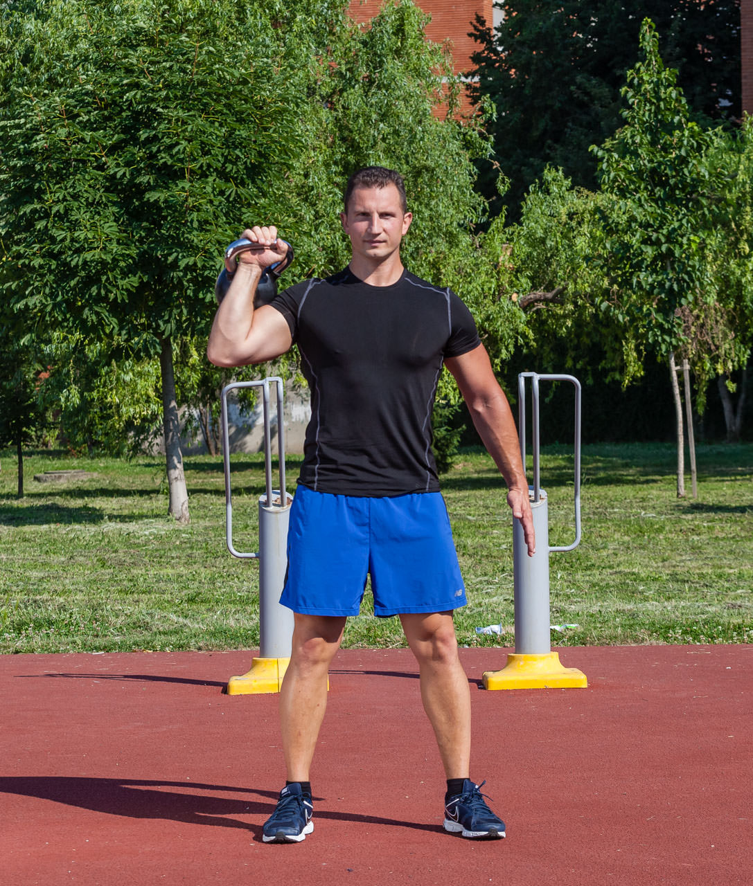 One-Arm Kettlebell Thruster frame #1