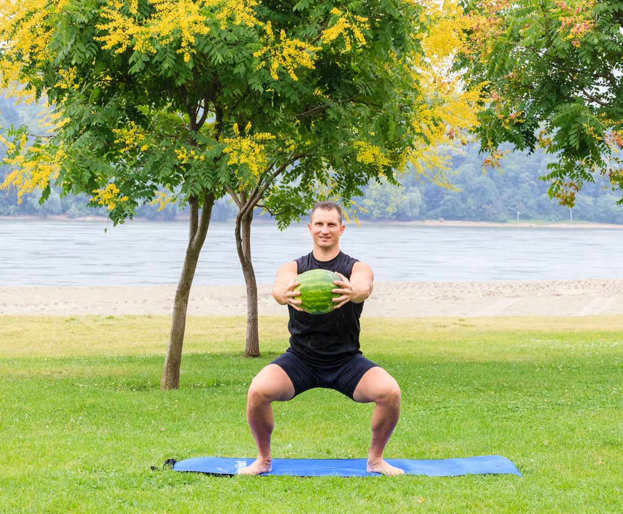 Watermelon Squat with Torso Rotation frame #2