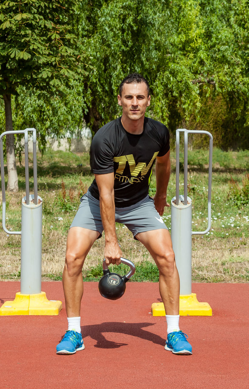 Alternating Kettlebell Swing frame #9