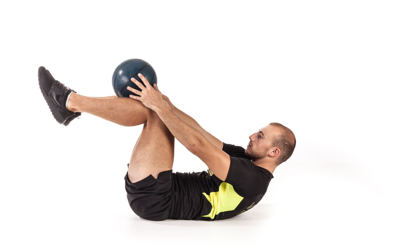 Medicine Ball on Legs Crunch Total Workout Fitness