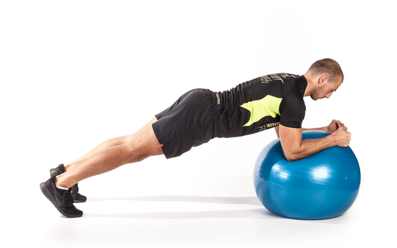 4 Ways to Do Leg Lifts With an Exercise Ball - wikiHow